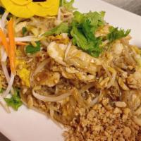 Pad Thai · Stir-fried thin rice noodle with egg, bean sprouts, green onion, and crushed peanut.