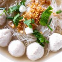 Meatball Noodle Soup · Rice noodle soup with beef meatballs and bean sprouts. Topped with fried garlic, cilantro, a...