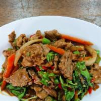 Pad Gaprow · Stir-fried with garlic, jalapeno, white onion, basil, red bell pepper, and in a brown sauce.