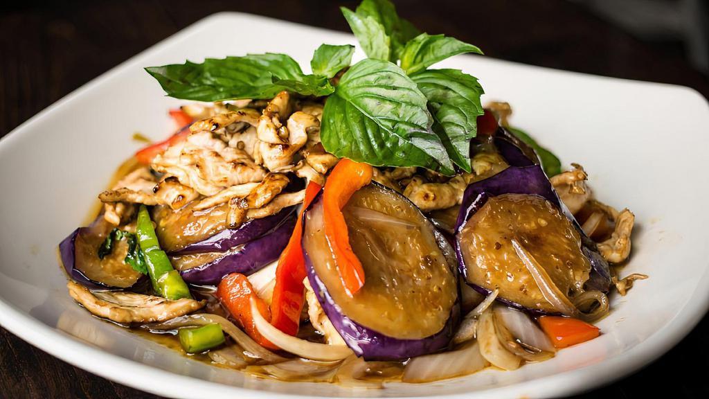 Pad Eggplant · Stir-fried with eggplant, white onion, bell pepper, carrot, basil, and green onion, and jalapeno, in a brown sauce. Spicy.
