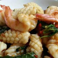 Basil Seafood · Stir-fried shrimp, squid, fish, mussel, and scallop with thai chili, garlic, white onion, ba...
