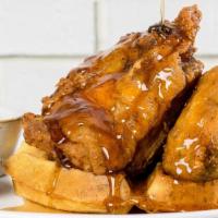 Warren'S Fine And Fried Chicken And Waffles · corn & cheddar waffles, bourbon maple syrup 4pc