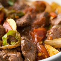 Yebere’ Tibs (Mild)  · Cubed beef sautéed in a blend of spices, onions, garlic, ginger & Kibe’ (clarified butter) w...