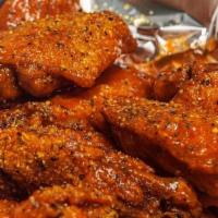 Famous Wings · Six famous seasoned wings served with seasoned fries and drink.