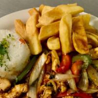 Pollo Saltado · Chunks of chicken, sauteed onions, tomatoes, green and red peppers, cilantro, green onions, ...
