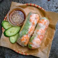 Grilled Shrimp Roll (2) · Hand rolled rice paper filled with fresh shrimp, vermicelli, lettuce, mint, cucumber and fri...