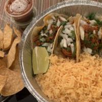Al Pastor Taco A La Mex · Flour soft corn tortillas, served with onion, cilantro, and meat with a side of rice and cac...