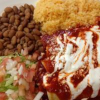 Mexican Enchilada · Choice of sauce and meat, served with rice and beans.