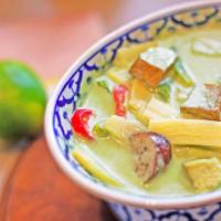 Green Curry · Simmered green curry paste with coconut milk, bamboo shoot, eggplant, bell pepper and basil.