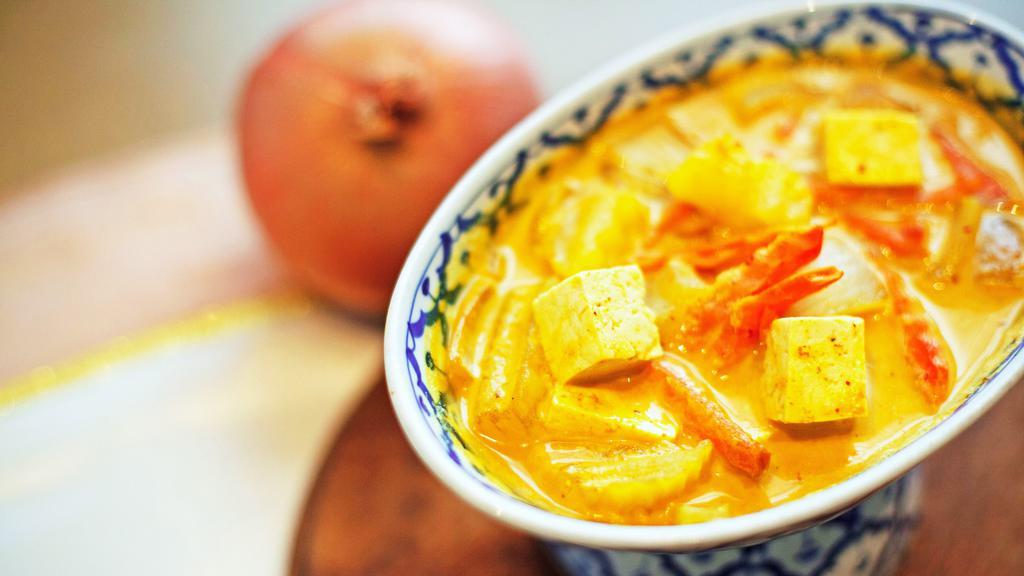 Yellow Curry · Simmered yellow curry paste with coconut milk, onion, carrot and potatoes.