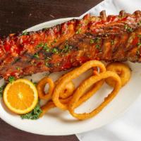 Bbq Baby Back Ribs · Half or whole rack of succulent baby back pork ribs, rubbed down, slow cooked, grilled and c...