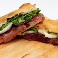 Calvana Sandwich - Regular Price · Bresaola (fine dry-cured beef), buffalo mozzarella and arugula