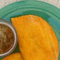 Jamaican Beef Patty · A Jamaican patty is a pastry that contains various fillings and spices baked inside a flaky ...