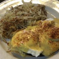Eggs Benedict · An english muffin topped
with smoked black oak ham,
corned beef or turkey, two
poached eggs ...