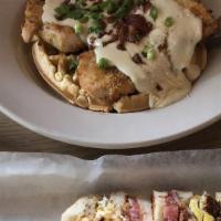 Chicken N' Waffles · Served after 9:30 am
Fried chicken crisps, black pepper county gravy, crispy bacon bits and ...