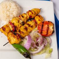 Chicken Kebob (2 Skewers) (Gluten Free) · Two skewers of grilled marinated chunks of chicken breast with tomatoes and peppers, served ...