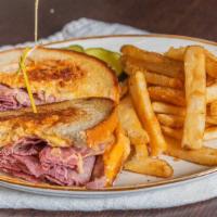 Mcreuben · Shaved corned beef, braised sauerkraut, Swiss, 1000 island, grilled rye. Comes with choice o...