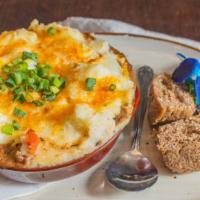 Shepherd'S Pie · Blend of ground lamb & beef, pearl onions, carrots, peas, corn & fresh herbs topped with gar...