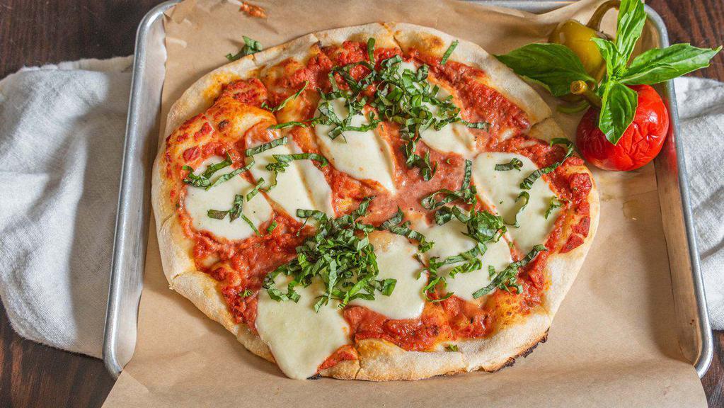 Margarita Pizza · Tomato Sauce, mozzarella, basil, Extra Virgin Olive Oil