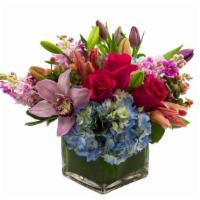Wild Thing · Wild thing - five inch cube with blue hydrangea and pink seasonal flowers. [flowers may be s...