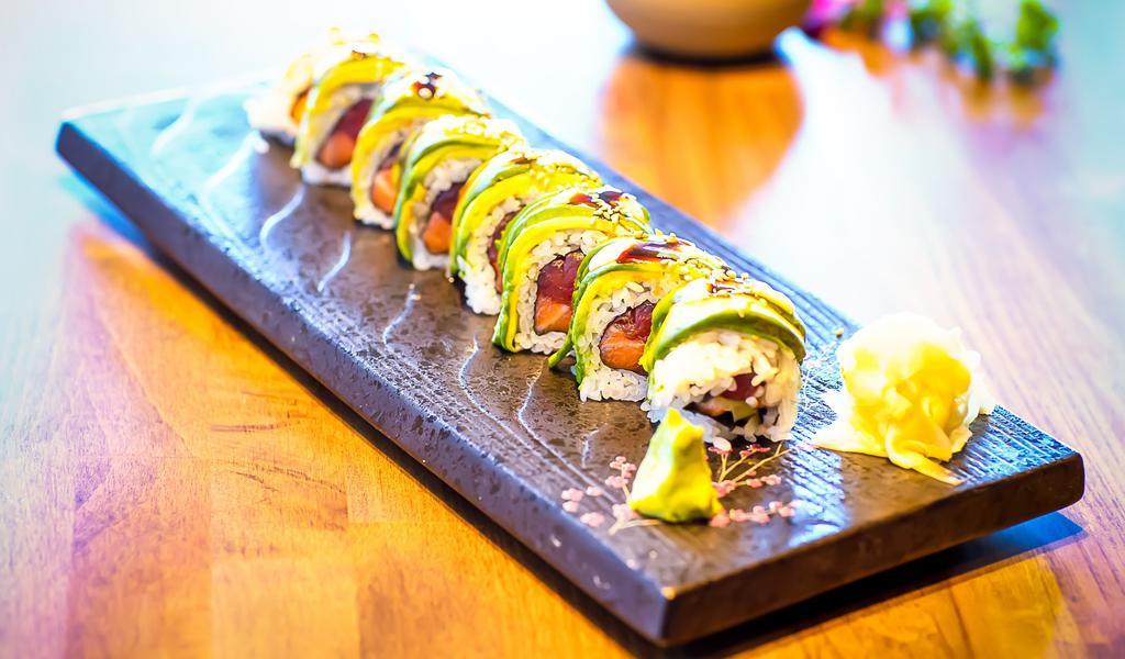 Caterpillar Roll · Tuna, salmon, cucumber and masago covered with avocado on the outside.