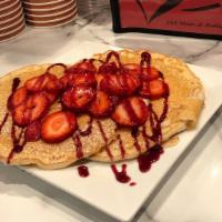 Strawberry Pancakes (2) · With strawberry and strawberry syrup.
