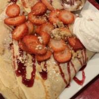 Strawberry Shortcake · Strawberry ice cream fresh strawberry, graham cracker, strawberry sauce and whipped cream.