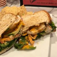 Chipotle Chicken Panini · Grilled chicken, tomatoes, onion, spinach, avocado, provolone cheese & toasted.