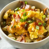 Huevobowl · Fluffy scrambled eggs, sautéed peppers and onions, diced tomatoes, fresh salsa and melted ch...
