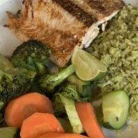 Grilled Salmon · Seasoned with pepper, spices and garlic lemon sauce. Served with poblano rice, steamed veget...