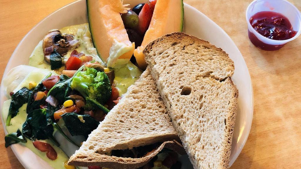 Californication · Sauteed red bell pepper, kernel corn, spinach, broccoli, onion, button mushrooms, and tomato stuffed into fluffy egg whites or liberally served as a crepe. Served with sliced cantaloupe, berries in season, and dry wheat toast.