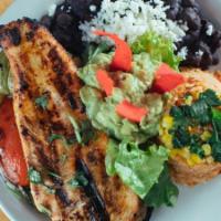 Chicken A La Buzz · Grilled marinated chicken breast and fresh market vegetables, served with rice, avocado reli...