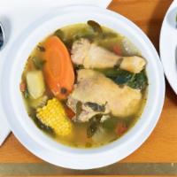 #12. Sopa De Gallina · Chicken soup with vegetables; served, with tortillas.
