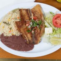 #32. Filete De Pescado (Tilapia) · Fish filet served with rice, beans, salad & two tortillas.
