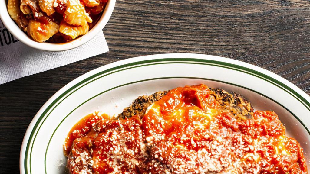 Chicken Parm Dinner · Hand breaded crispy chicken cutlets, topped with San Marzano marinara and mozzarella. . Served with rigatoni.