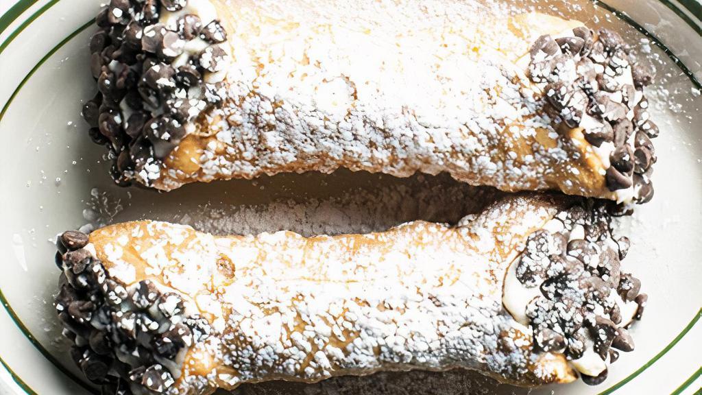 Cannoli · House made shells, ricotta filling, chocolate chips and powdered sugar