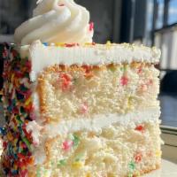 Birthday Cake · Two layers of funfetti cake filled and iced with vanilla buttercream and covered in rainbow ...