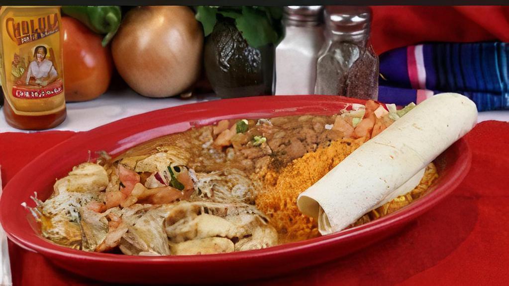 Pollo Del Mar · Grilled chicken and sautéed shrimp, mushrooms, onions and peppers all mixed with guajillo cream sauce and Monterey jack cheese, served with pico de gallo and flour or corn tortillas.