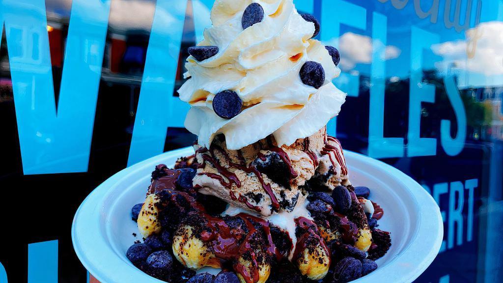 Bmore Foodie Waffle · Oreos, chocolate chips, hazelnut drizzle, one scoop of coffee oreo ice cream, maple whipped cream.