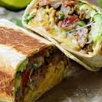 Burrito · Flour tortilla with a choice of protein, refried beans, lettuce, tomatoes, pickled onion.