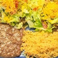 Chalupa Plate · Two hard tortilla with refried beans, cheese, choice of protein, lettuce tomatoes, cream.