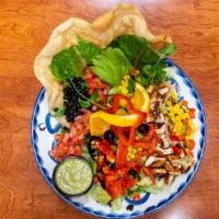 Chopped Mexican Salad · Chopped romaine and & iceberg lettuce with diced grilled chicken, avocado, tomatoes, red bel...