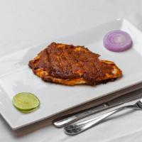 Malabar Tawa Fish · Tilapia. Fish fillets sauteed with coconut sauce and chefs special spice rub fried on a tawa.