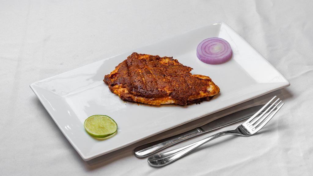 Malabar Tawa Fish · Tilapia. Fish fillets sauteed with coconut sauce and chefs special spice rub fried on a tawa.