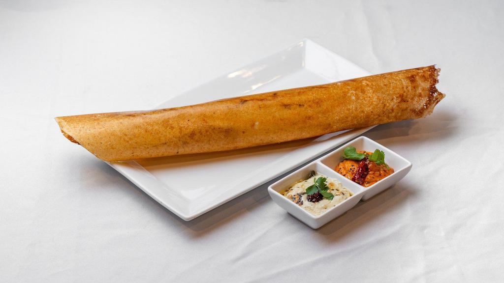 Masala Dosa · Savory crepe filled with mildly spiced mashed potatoes and onions.