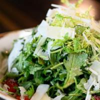 Arugula Salad · Parmigiano shavings, grape tomatoes, and balsamic vinaigrette.