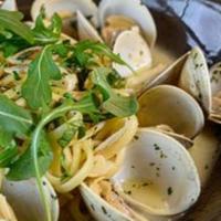 Linguine Alla Vongole · Linguine with little neck clams and garlic in a white wine. or marinara sauce.