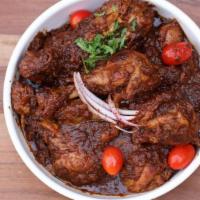 Thursday Special-Chicken Bhuna · Chicken grilled until tender added spices tomatoes and onion in special gravy.