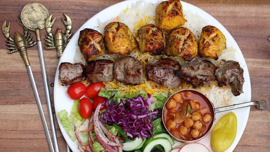 No 9. Chicken & Lamb Combo · One Skewer of Chicken & One Skewer of Lamb skewer served as a platter.