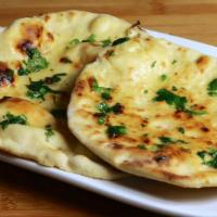 Tandoori Bread · Fresh baked Pita in oven served hot